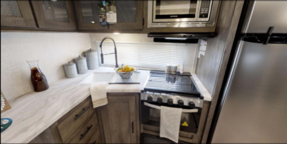 We have equipped the compact kitchen with all glasses, utensils, and dishware needed in any kitchen.  In addition to the nice-sized refrigerator and gas range, there is a coffee maker, a toaster, and a full set of pots and pans.