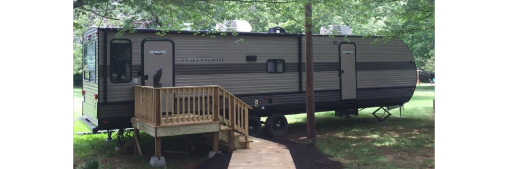 To help keep your feet out of the puddles on those rainy days, we have constructed a walkway from your private parking area to the RV.  Wide, easy to maneuver steps will take you up to a large landing at your main doorway.   The RV is adjacent to Seven Oaks property, but there is lots of privacy and the area is safe.